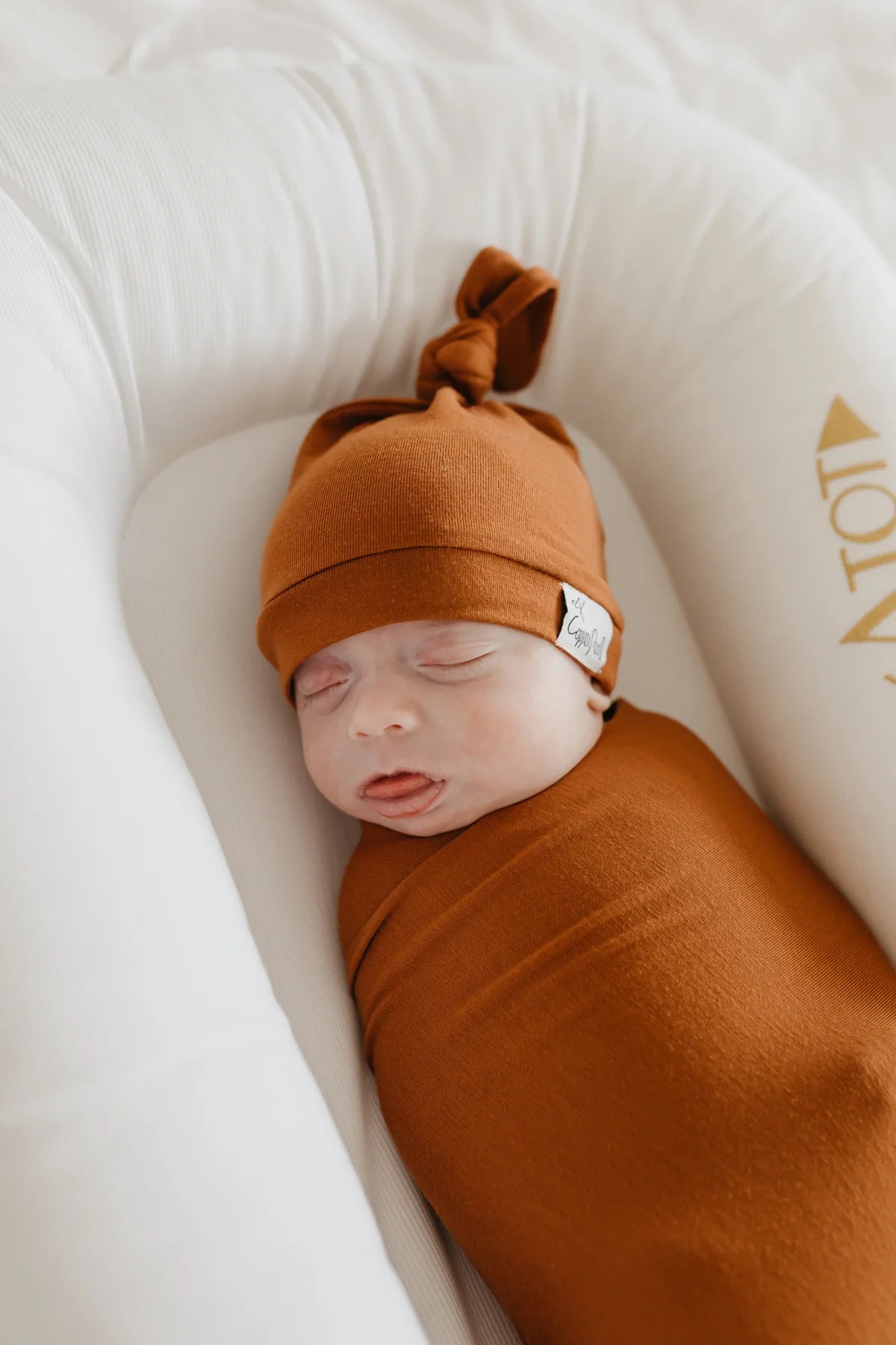 Powell Top Knot Hat